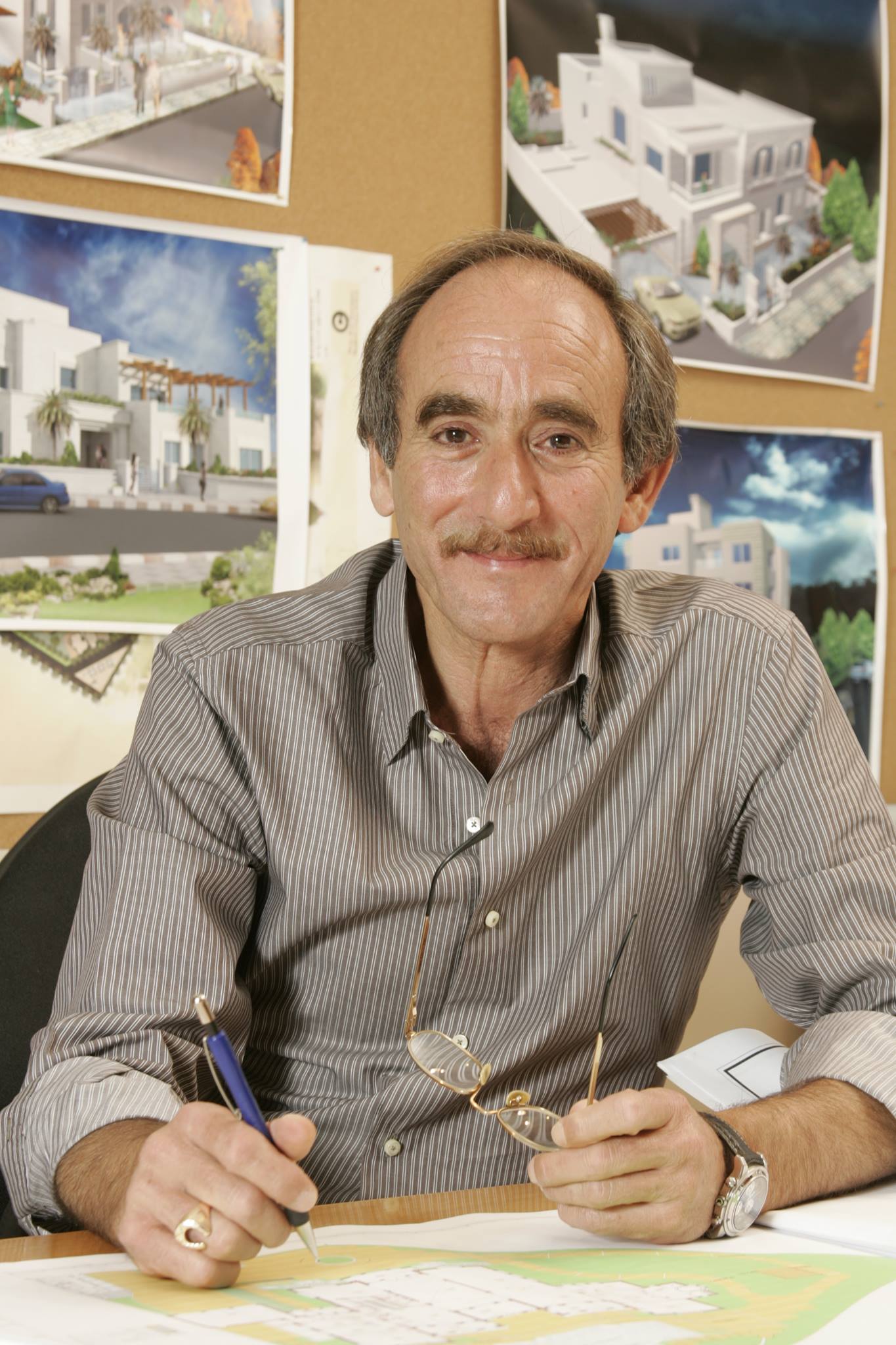 Nabil Goussous, Managing Director of NZG Architects, working at his desk