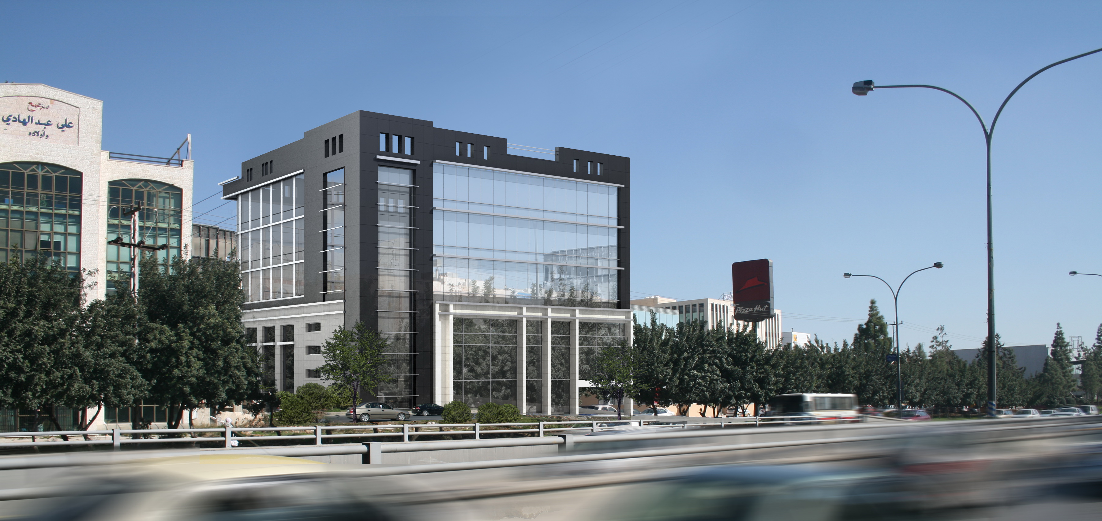 Khirfan commercial building with a glazed facade and urban street frontage